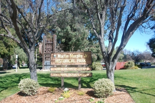 Murphy Park entrance sign showing Martin Murphy Jr. Historical Park with landscaping and mature trees