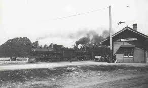Historic black and white photograph of Old Murphy Station with steam locomotive